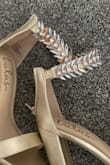 These didn't last one night. The jewels kept snagging my dress that I paid a lot of money beforehand on alterations and by the end of the night, half the gems had fallen out of the ankle straps. Terrible quality. - NICOLE M.