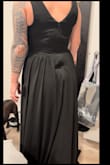 This style is very elegant and well made. It is meant for a very tall person and I am short but could easily get it hemmed. Top fit beautifully with room for a larger chest than I have. A tad too much material on bottom unless you're getting for a wedding gown or bridesmaid dress, I was only a guest at wedding. I went down a size which was a good choice. I suggest if in between sizes go to smaller size for sure. All in all I went with another dress on this site because of the length but this dress was very nice! Highly recommend. There was a small defect in zipper at back which you can see in pictures. - Kristina Y.
