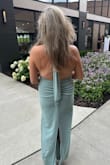 The cut and fit of the dress are flattering on all figures. Fit like a dream. Felt like a cloud. I have an athletic build and felt so feminine in this dress! So many compliments, especially on the back of the dress. I want it in pink too!! I will buy it as soon as you make it available! - Gayle K.