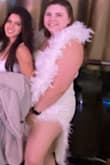 I wore this to my sister's bachelorette party in Vegas. It was tight and the slit was high, but it was cute and fit the occasion. Great for a night out! It was high, but nothing some spanks could not hide. The feather part can rub your skin and give you little scratches so watch out for that. - Madie S.
