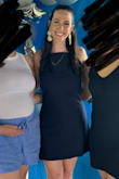 I bought this dress for my son's 1st birthday and it was perfect. It was an 89 degree day and I didn't find the material restricting or too heavy at all. It was perfect length even wearing spanx under. Would def recommend! - Jenna D.