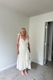 I absolutely love this dress. I ordered my normally wear a size medium, initially ordered it, exchanged it for a size large. My rib cage must be larger, because the large would not zip up either. I will take the dress to a seamstress and have it adjusted to fit. - Sharon R.