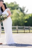 I ordered about 20 lulu dresses and this was the "one" from early on. It fit perfectly and was appropriate for me. I am an older bride and this was my second time down the aisle. It was a small, intimate wedding of 30 people. It was incredibly comfortable. I was able to wear a regular bra. The lace cap sleeve added such a nice feminine touch, without completely revealing my arms. It was too long and needed to be altered, but to me no fault of the dress. I'm short... It was a very heavy dress but it made it drape so beautifully! You can't go wrong with this dress! - Franceska L.