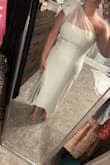 A perfect choice for my rehearsal dinner! I did have to exchange it originally from a large to an XL because I couldn't zip it up over my back but the XL is a little looser but still very cute. I love the tie with the pearls! - Cherokee S.