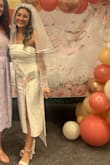 I loved this dress! It was a little tight but such a nice quality dress. The bow was beautiful and made me feel like a princess! - Christine P.