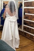 I ordered an XL but lost weight and had it taken in. It's a bit long, had to get that shortened. Overall the dress met my expectations! I loved it! I am very satisfied with my purchase. I was a beautiful bride! - Wendy R.