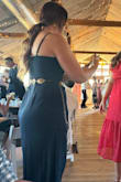 Okay, I absolutely LOVE this dress! NO BRA NEEDED. The fit was absolutely perfect and so comfortable!!
There was only 1 negative for me though. It was an outdoor wedding and it was windy. The wind blew the front part of my dress (slit) up and tried to showcase my goodies (lol). I did have to safety pin it to keep from blowing up and showing people what I didn't want them to see. I think that it's a super easy fix if the company wanted to, but it's not enough not to buy this dress.
BUY THE DRESS! I am not a stick, slender, or chunky(?). I'm not really sure how to describe my body shape, but I do have a pooch and thick thighs. This dress holds you in without restriction.
I added a back/side shot as well as the front. - Holly S.