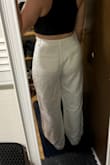 For my height it drags to the ground but I love the fit! I wear with high-waisted pants, looks so good and comfortable. It's not see through like other white pants. Totally recommend this will be my go to pants in summer!! - Saki P.