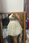 I really wanted to love this dress, but it was very unflattering and made me look a lot bigger than I am. The tulle was very wrinkly from shipping, and I didn't really know how to fix it without ironing it or something, so I just tried it on like it was and tried to pat it down. It was also extremely itchy, especially around the waist area. - Mariel R.