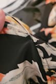 Had literally just taken the dress out of the package to try it on and saw the underwire poking through the front of the dress. I was able to weave it back in, but then the other half of the wire was just free-floating? Didn't waste my time seeing if it fit or was true to size (disregard the rating above for size as it was required) before preparing it to return. - Michele K.
