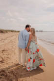 I got this dress for my engagement pictures and it's FANTASTIC. The fabric is so thick and luxurious. The colors are stunning and it is soooo flattering. Seriously, get it in every color. - Robin B.