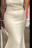 Comfortable and cool for a summer wedding. Did not need to hem w/3-inch heels. A little too wide on the chest area, just needed a little stitch to bring in near the zipper/straps. Nice lining. - Virginia M.