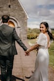 I'm obsessed with this dress! I knew from the start I didn't want a designer dress for my wedding so I was really glad to stumble upon Lulus (I'm based in Ireland). The quality is so good not just to the eyes but also to the touch. It was the perfect fit for me. Just added the sleeves to add some of my Filipino touch to it. I'm 5'2 so I got it shortened, but otherwise, no major alterations. Guests couldn't believe that my wedding dress was bought online! Love, love this! - Eleanor C.