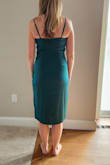 Bought for a cocktail party for work. Bought a small based on reviews and size chart; the color is beautiful; it fits everywhere perfectly... except in the bust. I tried with and without a bra, but the "cowl neck" that is supposed to lay nicely kind of just opens outward. It feels like I'm inviting everyone to just look down my shirt. And no way could I bend over. Super disappointed. Past the return time frame so going to see if I can have it altered. But this one may have been a waste for me. :( I'm a 34C, 29" waist, 40" hip, 135lbs - Carly B.