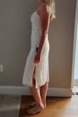 This dress is beautiful, true to size, and good quality. My pet peeve is when dresses that are supposed to have symmetrical beading are off-centered, and this one is perfectly symmetrical. I would love it if it stretched just slightly because it is a tad big in the hip, and you can see it when it's on. - Carly B.