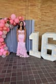 The dress was beautiful. It's made very nicely! A great color and material. The front was a bit long and over time the dress was a bit heavy. Possible could have added straps. Regardless, a lot of compliments were given on this dress! - Janelle M.