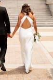 I wore this for my elopement ceremony and got some pictures taken after. The dress is absolutely gorgeous and it fits me like a glove! I ordered 2 dresses before this one that were way more expensive and didn't fit me right, I'm so happy I found this one! - Perla V.