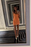 It's a beautiful tangerine color that is so flattering and I love that it pairs well with both gold and silver! I wore it for a night out in Vegas and got so many compliments! - Ashly C.