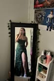 I was super scared this wouldn't fit but it fits perfectly. Its booby but perfectly not at the same time! Super long for the short girlies but alterations can  be made. I really love it! The slit is HIGH. Wear shorts or pin it. - Riley F.