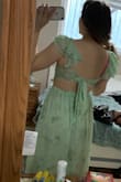 I do love this dress, but ultimately I returned it because I ordered a small and I'm definitely a medium. The waist band was just a little too tight  and that's the only reason I returned. If I had the right size this would be a fantastic dress for a wedding! The back is SO CUTE. - Kayley C.
