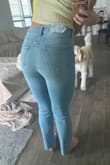 These pants fit pretty nicely. I sized down (normally, I am between a size 8 and 10, so I got a 28), and the pants fit well but a little on the tighter fit. If you're between sizes, I say go with the lower size but anything lower than your normal will def be a tighter fit. I personally prefer a slightly looser fit so if I could do it again I'd go with 29. But overall, the pants are comfortable, stretchy, and flattering. Great value - Marisa M.