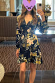 This dress was ideal for me as a wedding guest! I usually wear a small, but got an XS for this dress and it fits very well, the adjustable strings really help you adjust the fit how you like it! Made of a comfortable fabric that has a bit of a sheen which elevates the look. Highly recommend! - Sarah V.