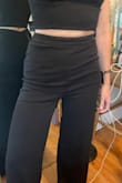 I ordered the small and the top was snug. The pants fit ok but were quite tight around my waist, and the crotch was long on me which didn't make for a flattering fit. I'm a 32B/size 27. - Casey N.