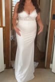 Such a beautiful dress, true to size. I'm 5'7 and 170ish lbs. I have big hips and a little tummy. Size L was PERFECT. I didn't have to have anything altered and felt super confident. - Spencer N.