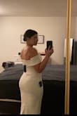 Love this dress! It's is super comfortable and very stretchy, which is good because I bought the wrong size. I'm normally a 6-8, but I all my individual measurements fell under the small. Definitely should have gone with the medium, but I still love the dress and I'm very excited to wear it for my bridal shower! The bow just snaps onto the back (not included in the pictures). - Tori G.
