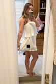 Love this romper! Fits way better than the jumpsuit version. I got this for my bachelorette party dinner in Vegas. Seems comfortable and not tight. Hides my belly and isn't low-cut! I think it will be good for Vegas! I'm short so it's not super short on me! Fabric has a pretty sheen and texture! Good for bigger chested girlies! Buy it! - Kayla A.