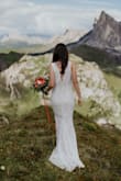 I ordered three dresses to try on for my ceremony in the mountains and this one was the winner! It fit like a glove and super comfortable to move around in. I had it hemmed and a bustle added. So so happy with it. - Kelly S.