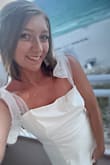 I ordered this last minute for my beach bachelorette and it was absolutely PERFECT! I got soo many compliments and felt so pretty! I'm normally a Medium, but read the reviews that it was a little short and ran a little small and it fit perfect!! It was just slightly loose in my back but it was perfect!! The detail of the bow straps is perfect. If you're considering buying, DO IT! - Rachel P.