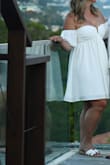 This was the perfect dress to take on vacation. It was easy to pack and it didn't wrinkle. It was humid in Barbados, so I didn't want a stuffy dress. This dress was comfortable and I loved the puffy sleeves. - Celest O.