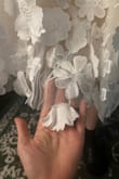 I was so excited to receive this dress. I should've gotten a size medium, but that's not the issue I have with it. The 3D flowers were hanging off at the bottom in a few places (like folded over) and on the straps where the seam is, the tulle is bunched up and the seam is horrible. It's just very bad quality for $128. I would expect it to be no more than $40. That would make it worth a trip to the seamstress to fix the issues. - Haleigh H.
