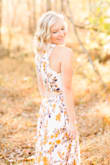 This dress was the perfect dress for my engagement pictures this past fall!  It fit perfectly with me wearing about 4" heel.  The fabric was high quality and the colors were just as pictured.  The little cut out in the back was such a cute touch!  Couldn't have asked for a better dress to wear! - Danielle K.
