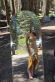 The material and fit was absolutely perfect! It did fit me a little tight around the waist, but that's because I'm personally a little bigger at the moment, but it still fit amazingly! I ordered this dress for a wedding and it was perfect. - Denise C.