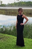 Beautiful dress... It fit like it was made for me! Most dress are on the short side but I am 5'9 and I needed heels. The material has sone stretch and heavy enough to hide those unwanted spots but ok for summer evening. Got a lot of compliments! After trying on another dress my hubby said THAT is the one! - Holly N.