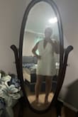 This dress is very comfortable and well-made. The fabric is thick and is not see-through. I ordered an XL and there was no other option to go up. I think it fits snug but I would have liked it to be a little looser. I am going to be using this for my engagement photos! Love the open back and Bow! - Alei M.