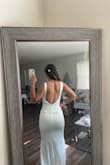 Really love this dress. Simple, elegant, and good material. The satin is of good quality. A few minor details are that the liner sometimes did not line up with the top layer. The chest/shoulder fit was a little awkward, but alterations could improve that or if you have bigger breasts (my chest is small so I did not fill in the chest area). It does not have cups. Overall, a good dress. May try a size M to see if that solves the liner issue - Maria L.