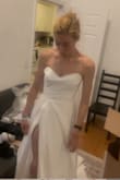 It's such a great dress at a great price! Ran a little tight in my experience. But it's great. Probably need to tailor a bit (suuuuuper long). And I think the fabric may need some wrinkle reducing. But it's a real wedding dress for a real good price so I recommend it. The fabric is a little hot. And the zipper had some issues. But it's a 4.5 dress (can't do half points). But it's a 5 given the price. - Sarah S.