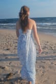 I bought this for an engagement photo sesh on the beach and it was perfect! The back is adjustable so I could make it as tight as I wanted. - Sarah H.