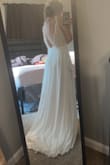 This dress is beautiful! It fit perfectly beside the length. I had about 6 inches taken off the bottom. Very excited to wear it on my wedding day! - Erica T.