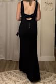 This dress is great for a formal event. The back is beautiful, and the front is perfect for small-chested ladies! I have difficulty with sizing, as my bust is XS, waist is S, and hip is M/L. I ended up going with the size small, and it does fit. The waist is a perfect fit. It is stretchy enough to accommodate my larger hips, though my thighs do feel like they are squeezed together. It fits great at my bust with or without a bra - I have tried many other size small dresses and all have been too large for my bust. Overall, it gives the classic and feminine vibe I was going for. - Kaitlyn G.