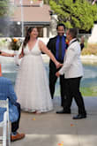 Beautiful dress that I wore for my summer in July wedding. Love the way it fits and looks. Almost makes me feel like a princess with the way the bottom flares out. A little bit too low in the chest area for me, so I had it tailored to bring in the sides and get rid of the cleavage. But other than that, fits great! - Katie C.
