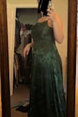 I'm a 36DD, there was no room for the boobs and no stretch, plus the top looked really weird on me. I exchanged for a larger size to see if it would work up top for me, the answer? No. Don't recommend, the rest of a the dress was really big on me. The 2 pics are different sizes. 1st is M 2nd is L. - Lauren M.