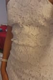 The lace is pretty and the fit is nice around the hips/waist. But for my chest area (28B), it was a tad bit loose and it also is a very rough material, the lace isn't soft. It's very thick and made of thick thread so it's not the most silky and soft to wear and when bending a little bit or even walking or raising your arms, it does a weird pokey triangle thing that you can see in my pictures. It was NOT see through at all, even with black underwear. I did return this. - RISHITA P.