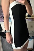 Elastic fabric and with a slim cut. Everything is perfect! Stylish and easy to carry. Beautiful!!! - Carol N.
