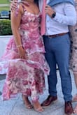 Absolutely loved this dress! It was so comfortable and the perfect dress for a June wedding. It gave a flowy look with the tiered layers. The straps tie and can be worn how you wish. The bust was a flattering look with your bust showing but made it look classy (if you got it, flaunt it). Highly recommend for a wedding! I received so many compliments! - Cristina T.