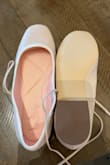 Looks super cute/fit the ballet-core aesthetic. Decently roomy toe box. A tiny bit lighter pink than in the photos. Definitely pink not peach. Look well-padded in the photos, but it's not actually memory foam; it's a very thin squishy layer? They don't really feel padded at all. [They're] flats, so I was not expecting arch support, but they're so flat/flexible that the heel is the only rigid part. It feels a bit odd to step (like the heel hits the ground first? I'm sure, if I walked over rocks, I could feel them through the shoes. The tie is some kind of squishy material similar to the outsole of the shoe. Seems sturdy enough. I think this shoe would be a good fit for an office job or non-walking/non-outdoor activities. True to size and I'm a 7 flat, 7 1/2 heels. - Brooklyn Y.