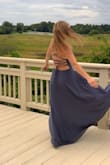 I love this dress, but I kept getting mistaken for a bridesmaid all night so wear it with caution. Check with the bridesmaids to see what color they're wearing first! Medium fit perfectly and I love the strap back. - Robin B.
